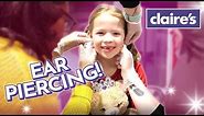 Maya Gets Her Ears Pierced at Claire's