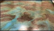Ebony And Turquoise Acid Stained Basement Floor