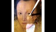 See a Jacobean Panel Portrait (1617 in England) with its yellow varnish removed after 100s of years.