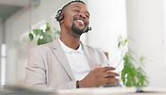 Black man, telemarketing and web crm consultation in a office with a happy worker
