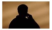 Male silhouette calling on the phone