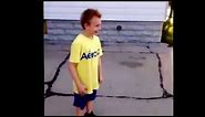 Crazy kid gets hit in the head with a basketball
