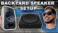 Backyard Speaker Setup Featuring The Sonos Amp And Sonance Patio Speakers | Russound Rock Speakers