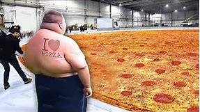 He eats worlds largest pizza in 10 seconds..