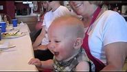Funny Baby laughing so hard his face turns red