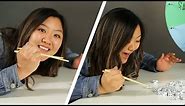 People Test Their Chopstick Skills