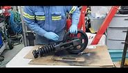 Excavator idler and track tensioner install