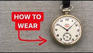 How to wear a pocket watch on a leather strap with a fob.