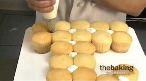 Numeral Cupcake Cake Design from DecoPac - First Birthday Cupcake Cake