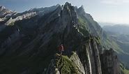 Aerial view of a person hiking on the mountain top, Wasserauen, Switzerland.