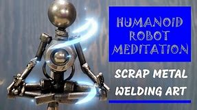 HUMANOID ROBOT MEDITATION IN YOGA POSE. Scrap Metal Welding Art. Zen cyborg metal sculpture.