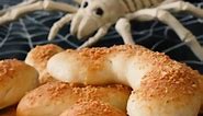 Bake up these Bone Chillin’ Breadsticks to spook up your next soup or chili night. #halloweenfood #rhodesrolls | Rhodes Bake-N-Serv