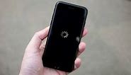 iPhone 12 shows spinning wheel with black… - Apple Community