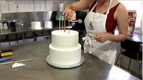 Stacking a four tiered cake