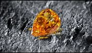 1.05 carat, Fancy Vivid Yellow Orange Diamond