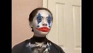 Stan twitter- person putting on clown makeup