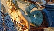 Why are mermaids on ships' prows considered good luck?