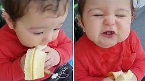 Cutest baby boy ever chows down on tasty banana
