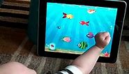 S demonstrates variety of baby apps on the iPad
