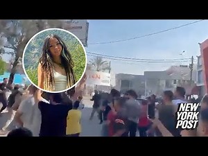 German tattoo artist ID’d as woman paraded through streets by Hamas