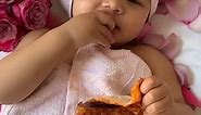 BABY EATING PIZZA