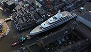See superyacht squeeze through narrow canals
