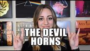 Where Did Rock + Metal's Devil Horns Come From?