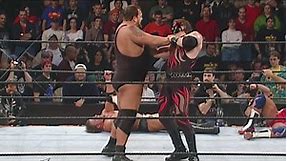 Kane shows off his immense strength by lifting Big Show over-the-top-rope: Royal Rumble 2002