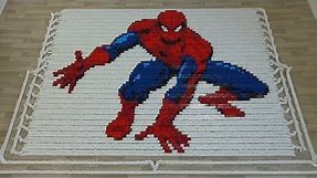 Superheroes in 58,000 dominoes