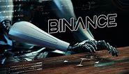 Binance Text Animated With Ai Robot Businessman Typing On A Futuristic Keyboard