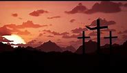 Silhouette of three crosses at sunset