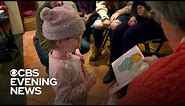 Community learns sign language to engage with 2-year-old girl