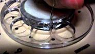 How to remove and install the dial on a rotary phone