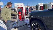 Watch How Easy It Is To Charge A Rivian R1T At A Tesla Supercharger
