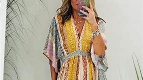 Check out this jumpsuit with a really cool vintage print, and it's got flared sleeves and wide-leg bottoms. The frilly detail at the bottom gives off a real hip, bohemian vibe - it's the perfect piece for a super cool holiday or summer look . #bohemianstyle #bohojumpsuits #bohochic #palzzojumpsuit | Studio12