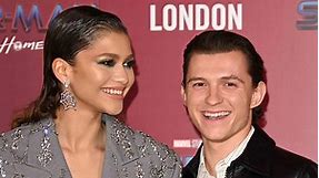 Zendaya Wore a Silky Slip Dress and Knee-High Boots During a Rare Date Night With Tom Holland