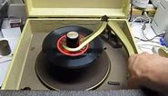 Repair of Zenith record player - portable1958