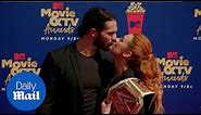 Sealed with a kiss! WWE champions Becky Lynch and Seth Rollins