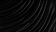 Black background Abstraction effect. Spinning Black Wave Lines. Looped animated background.