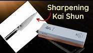 Sharpening a Kai Shun knife on a Kai whetstone