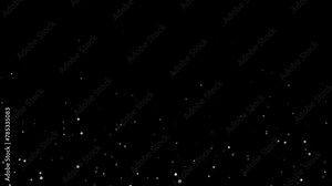 Abstract specks of dust with a white bokeh effect on a black background.