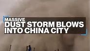 Huge dust storm engulfs China tourists