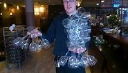 How to carry 24 wine glasses only one hand