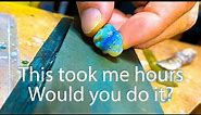 Hand polishing opal using sand paper