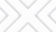 A Subtle Monochrome Pattern of Grey Arrows on a White Background