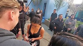 Kim Kardashian reveals her curvy figure in busty black bodysuit