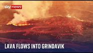 Iceland volcano: Fissures open up in ground as lava flows into Grindavik
