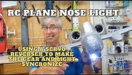 How to sync the nose light and front landing gear on RC Plane