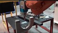 Robotic Laser Cutting Head with Bull's Eye TCP Calibration