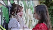 stock footage sad woman crying while hugging a friend color